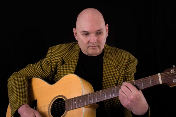 Chas as heidie with guitar